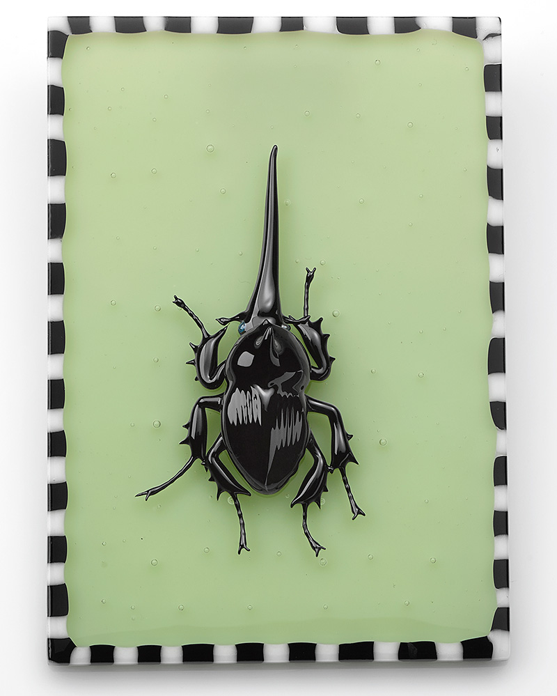 Relaxed Black Rhinoceros Beetle, glass dragonfly by Wesley Fleming